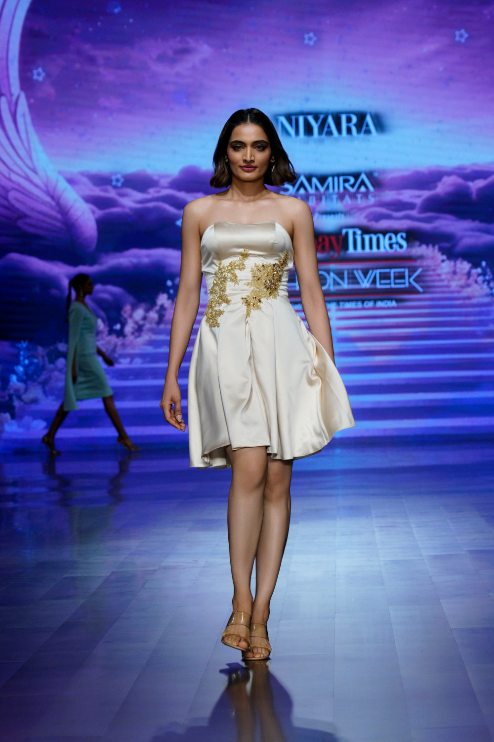 Champagne satin mini dress with gold embroidery (front profile)