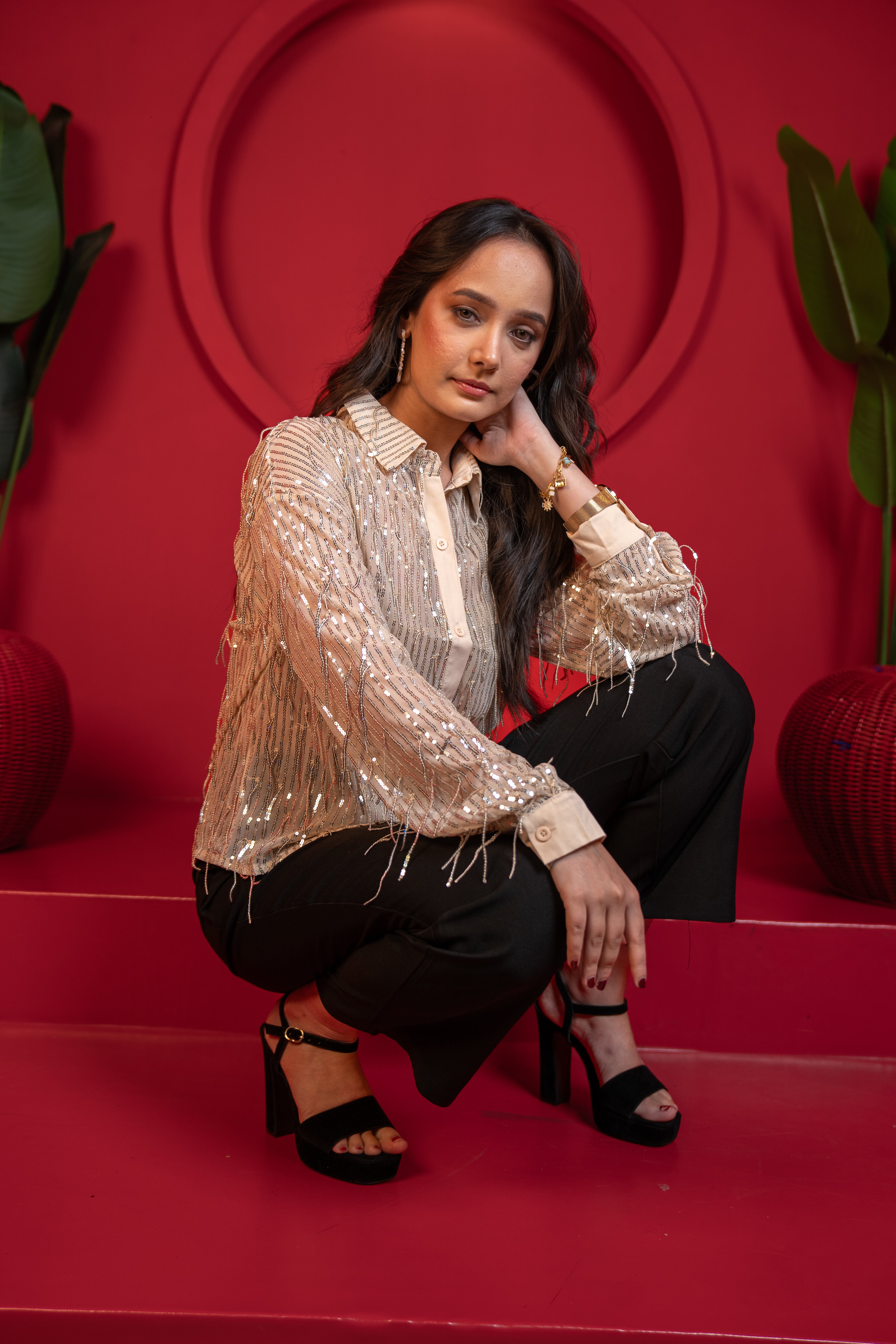 Flowy beige shirt with textured details seated profile