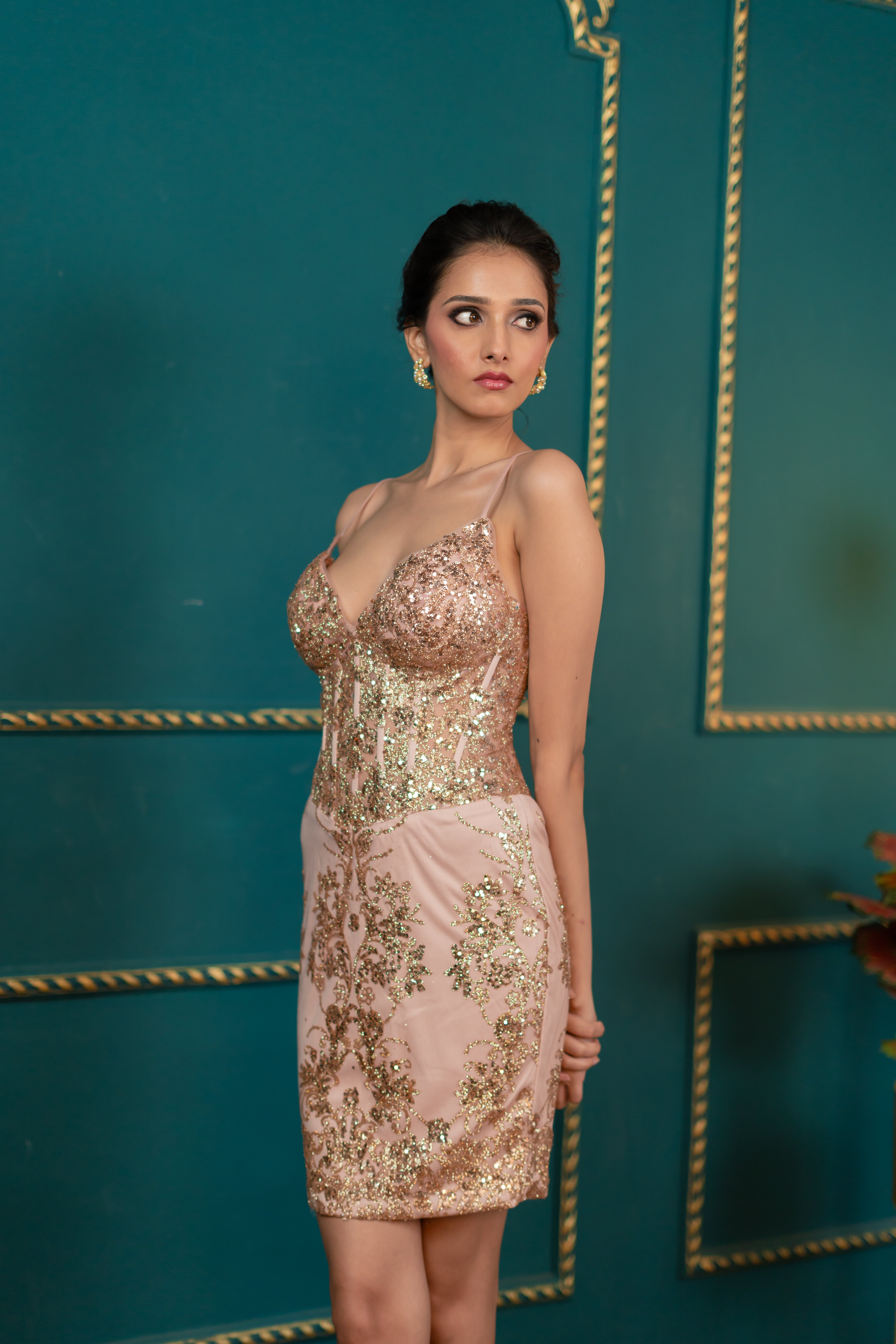 Pink embroidered wedding guest dress (right profile)
