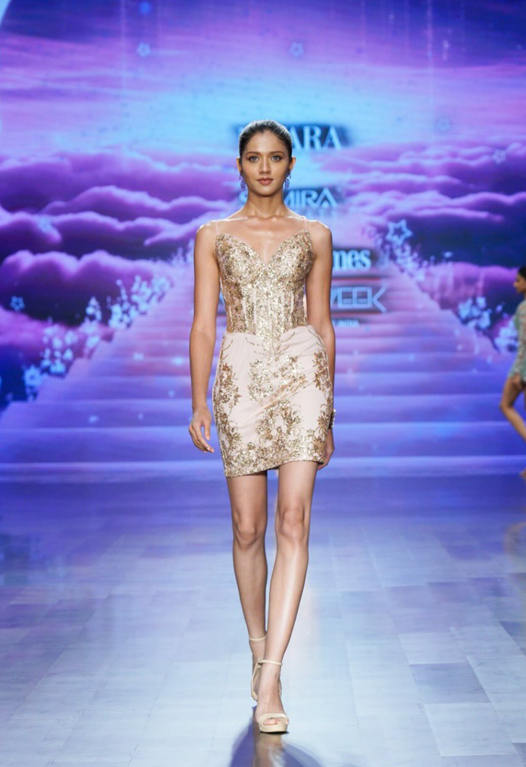 Blush pink corset mini dress with gold embroidery (front profile)