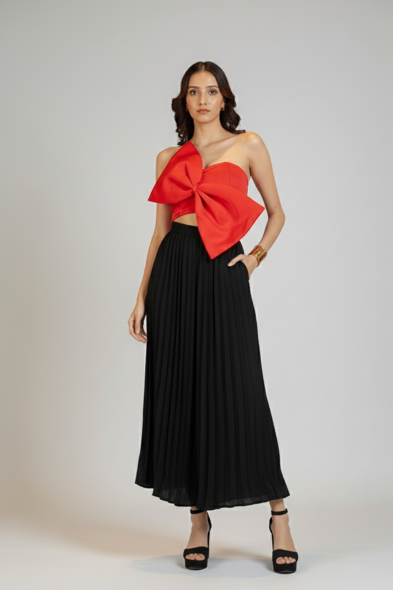 women wearing black pleated trousers