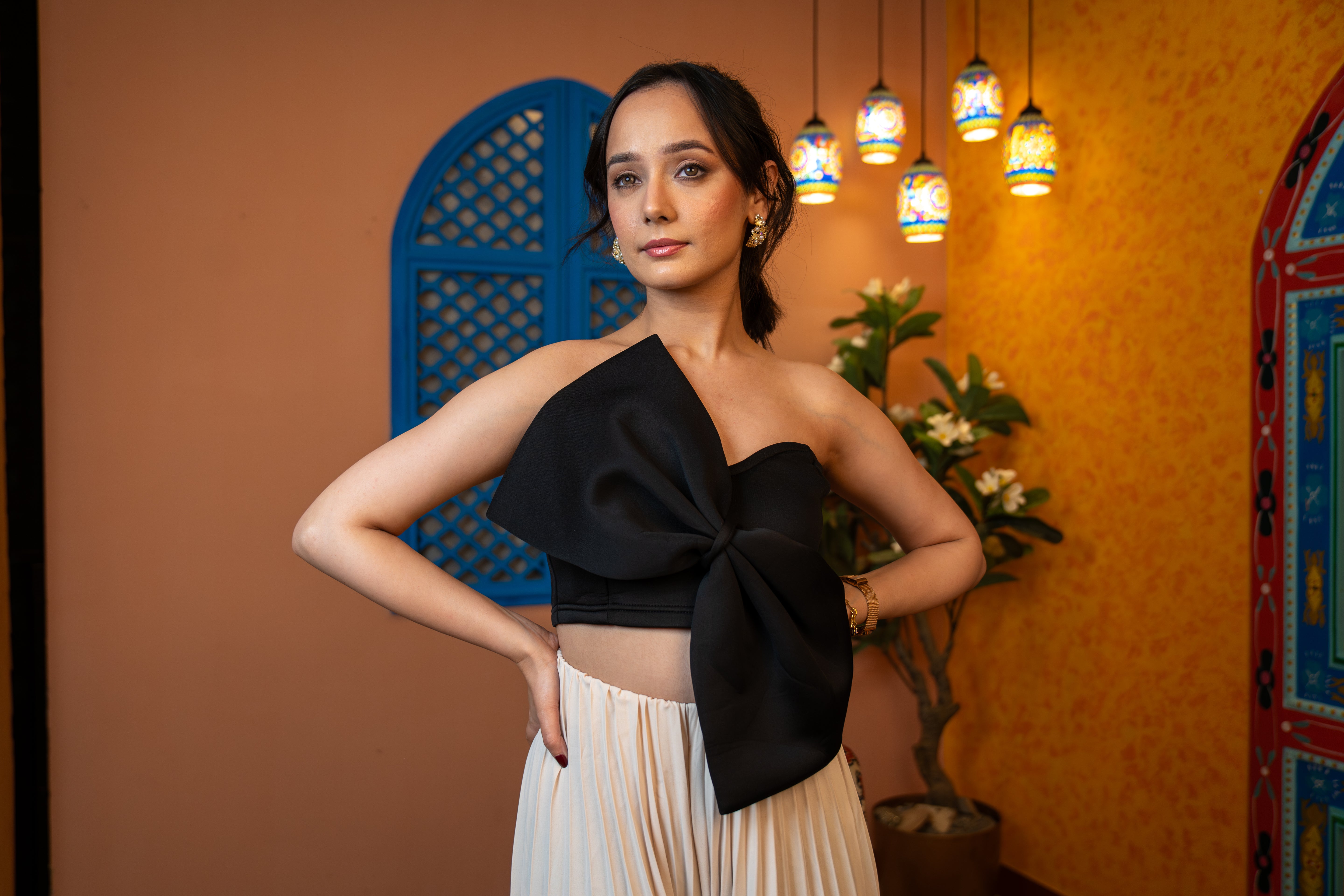 woman wearing Strapless black statement top for women