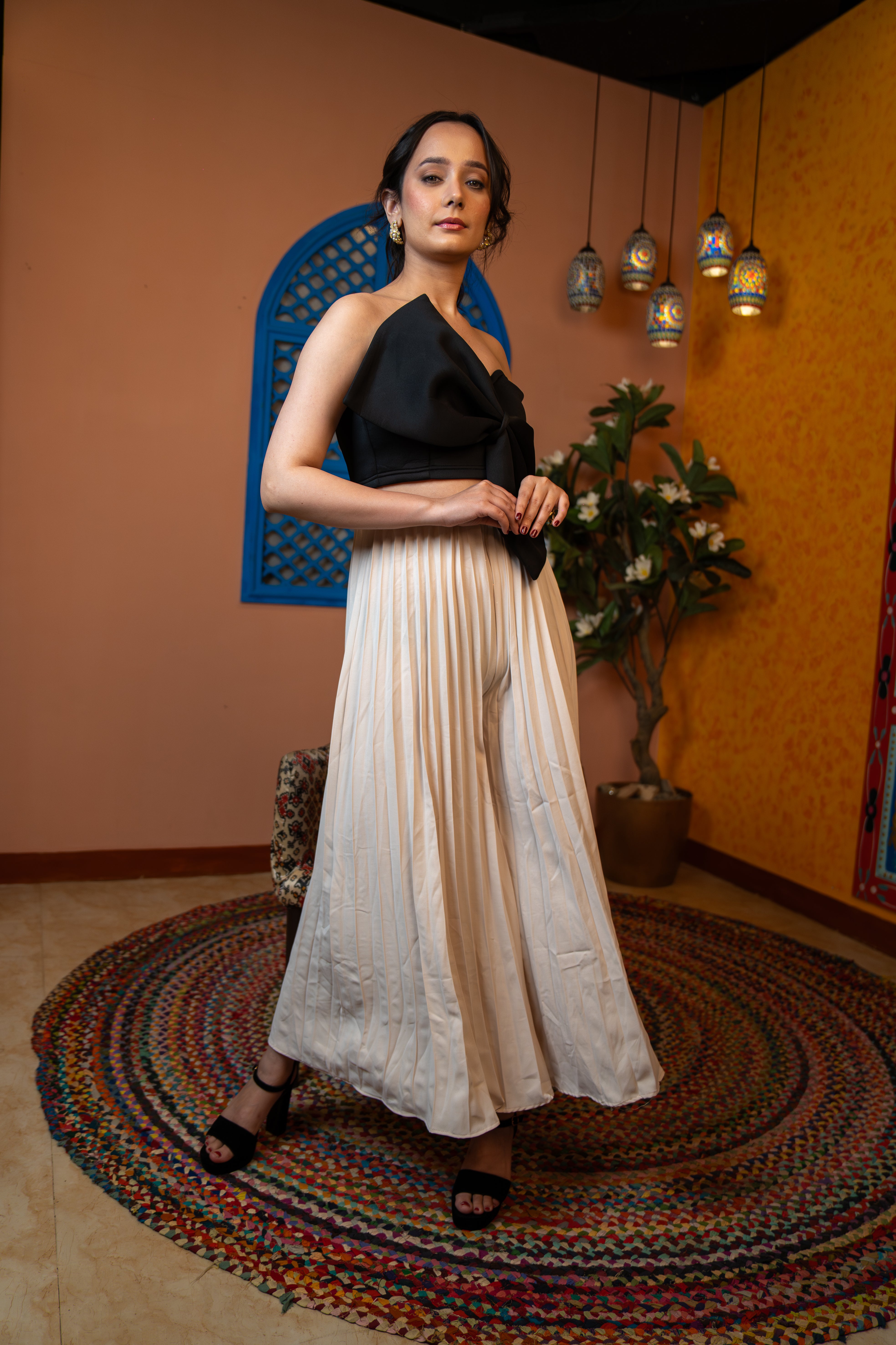 woman wearing Strapless black statement top for women