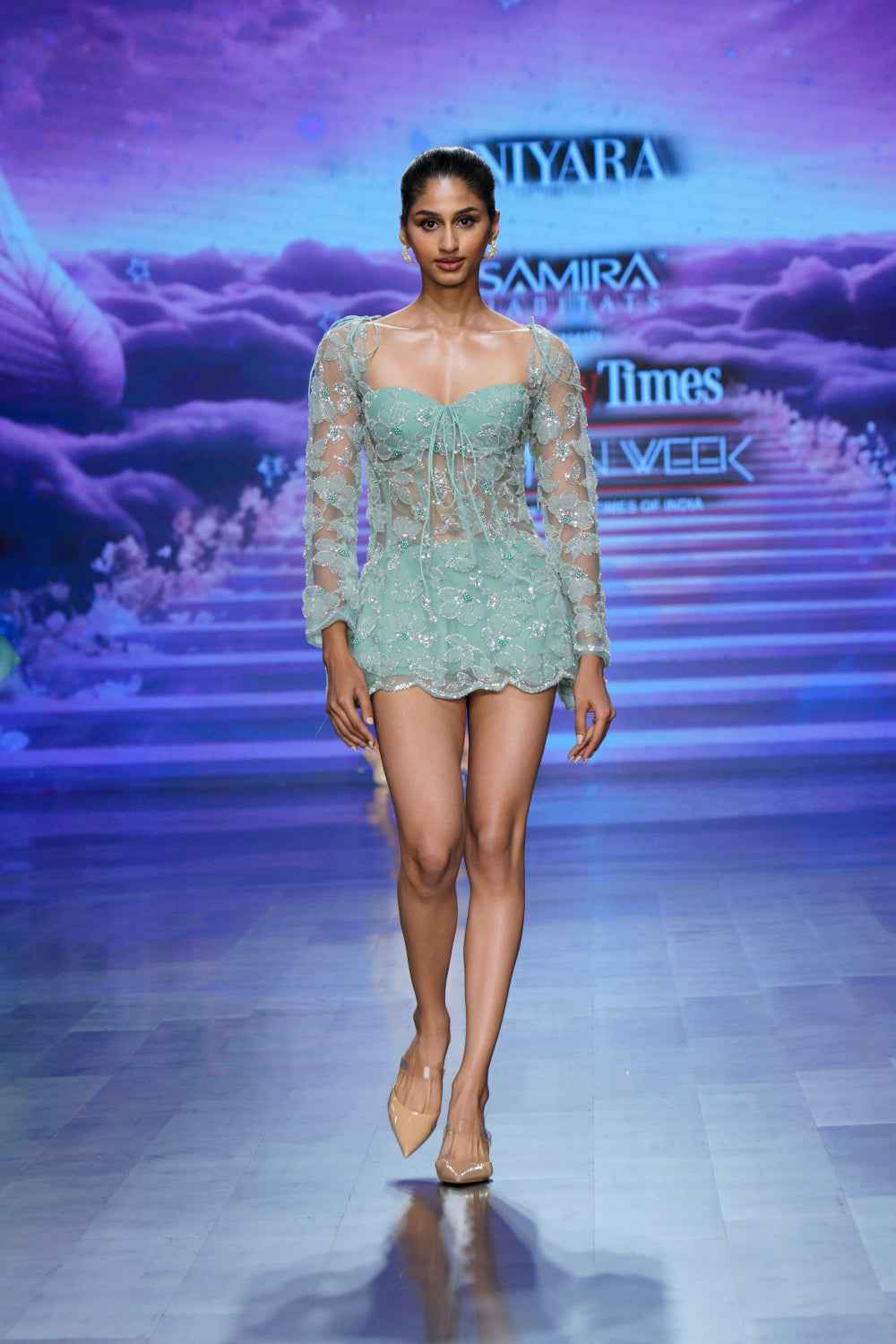 Mint green embroidered mini dress with sheer sleeves (front angle)