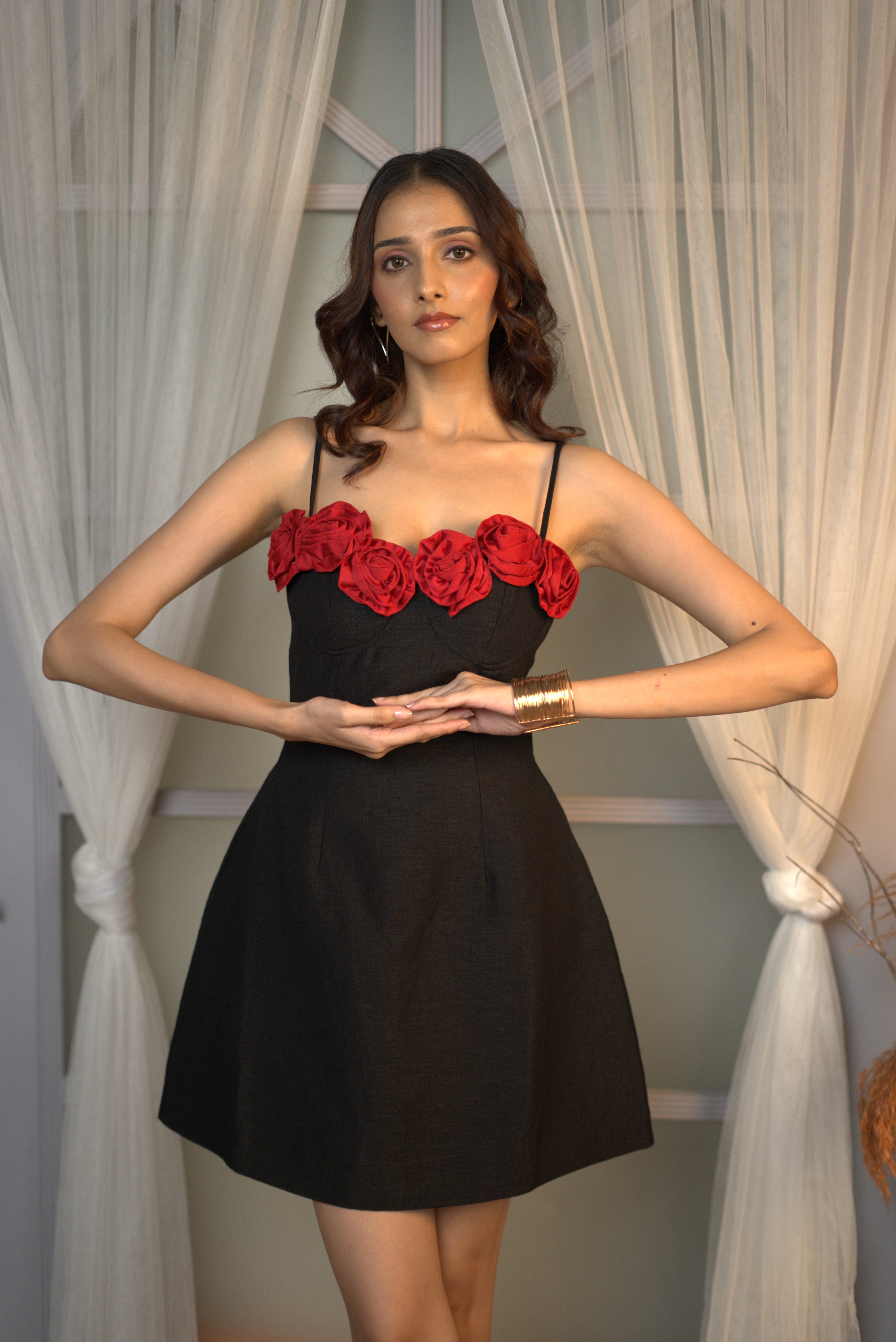 Statement black dress with adjustable straps (front profile)