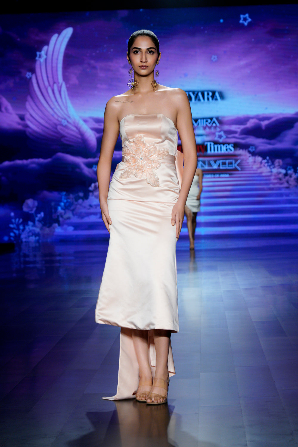 Luxury women’s dress for weddings and parties (front profile)