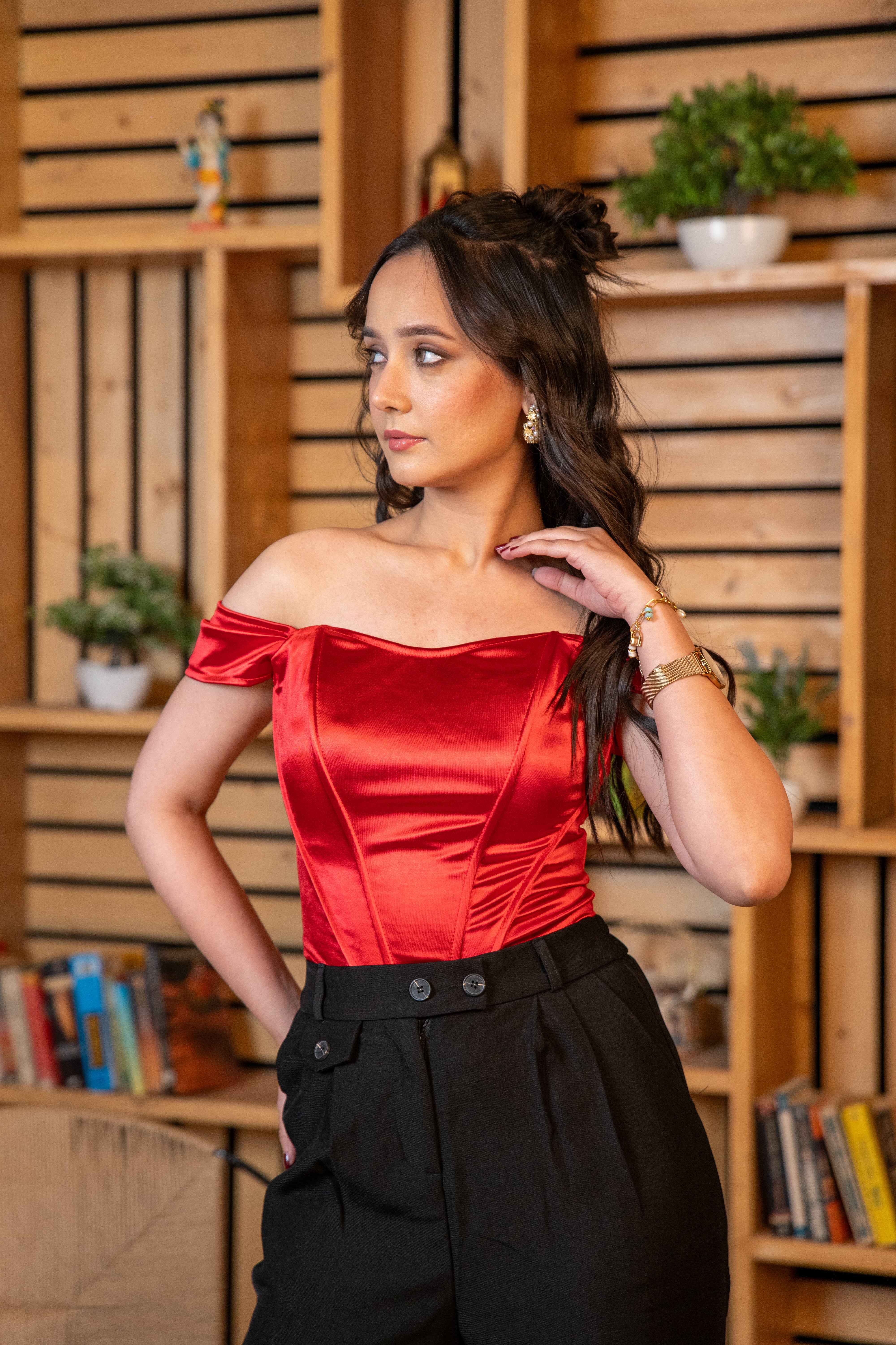 woman wearing Sculpted fit red corset blouse