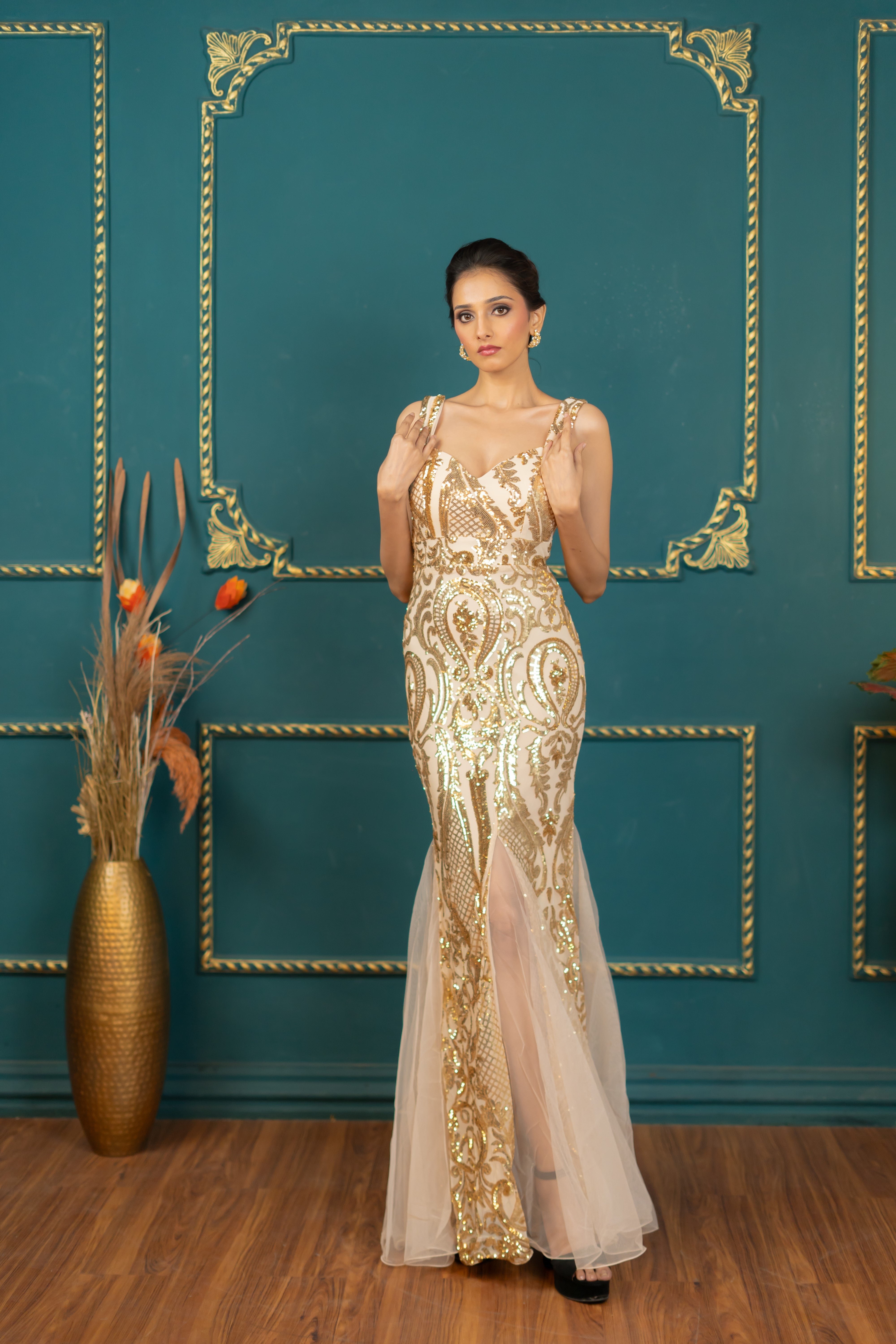 Close-up of gold sequin embellishments on formal dress (front profile)