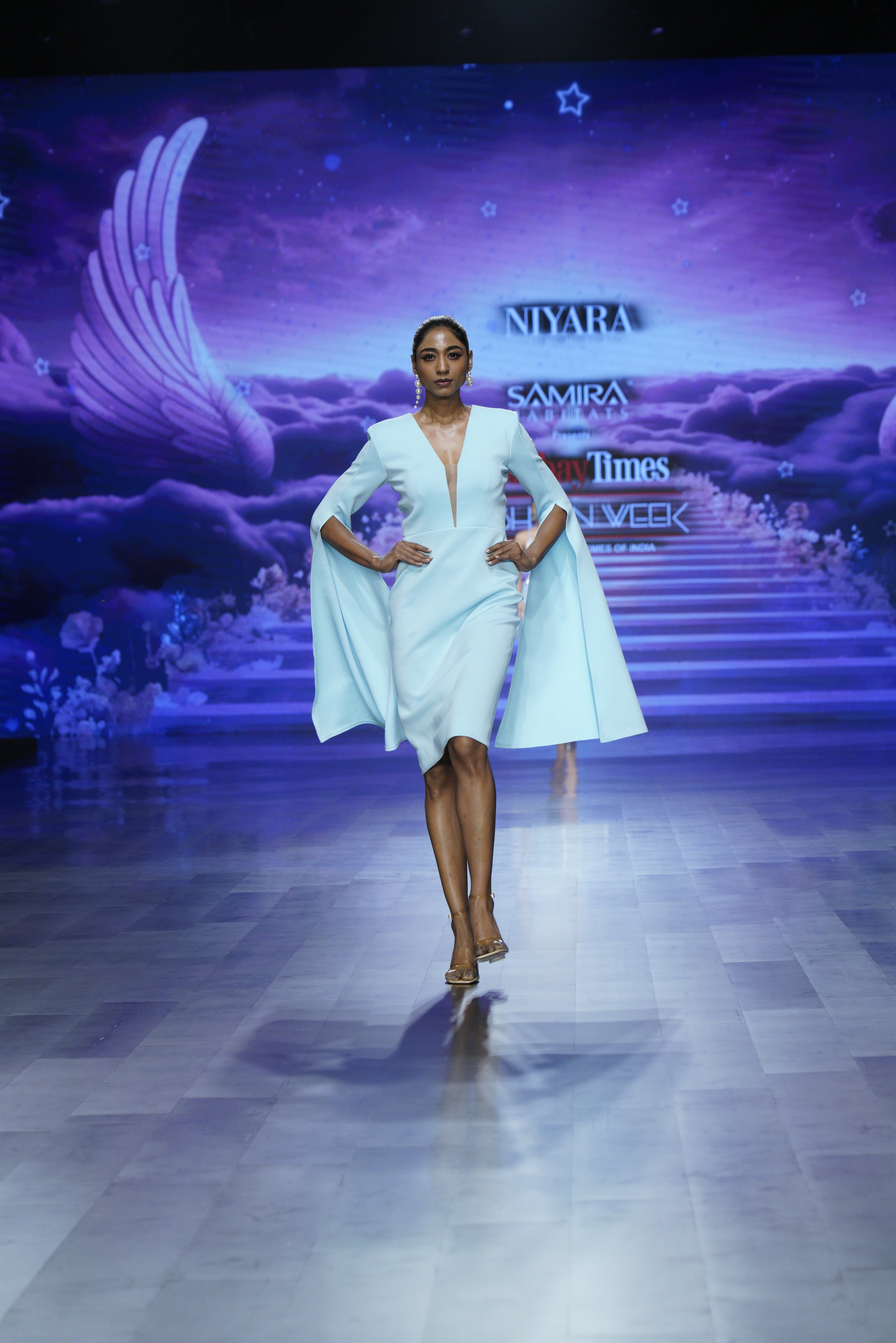 Power cape midi dress with winged sleeves (front profile)