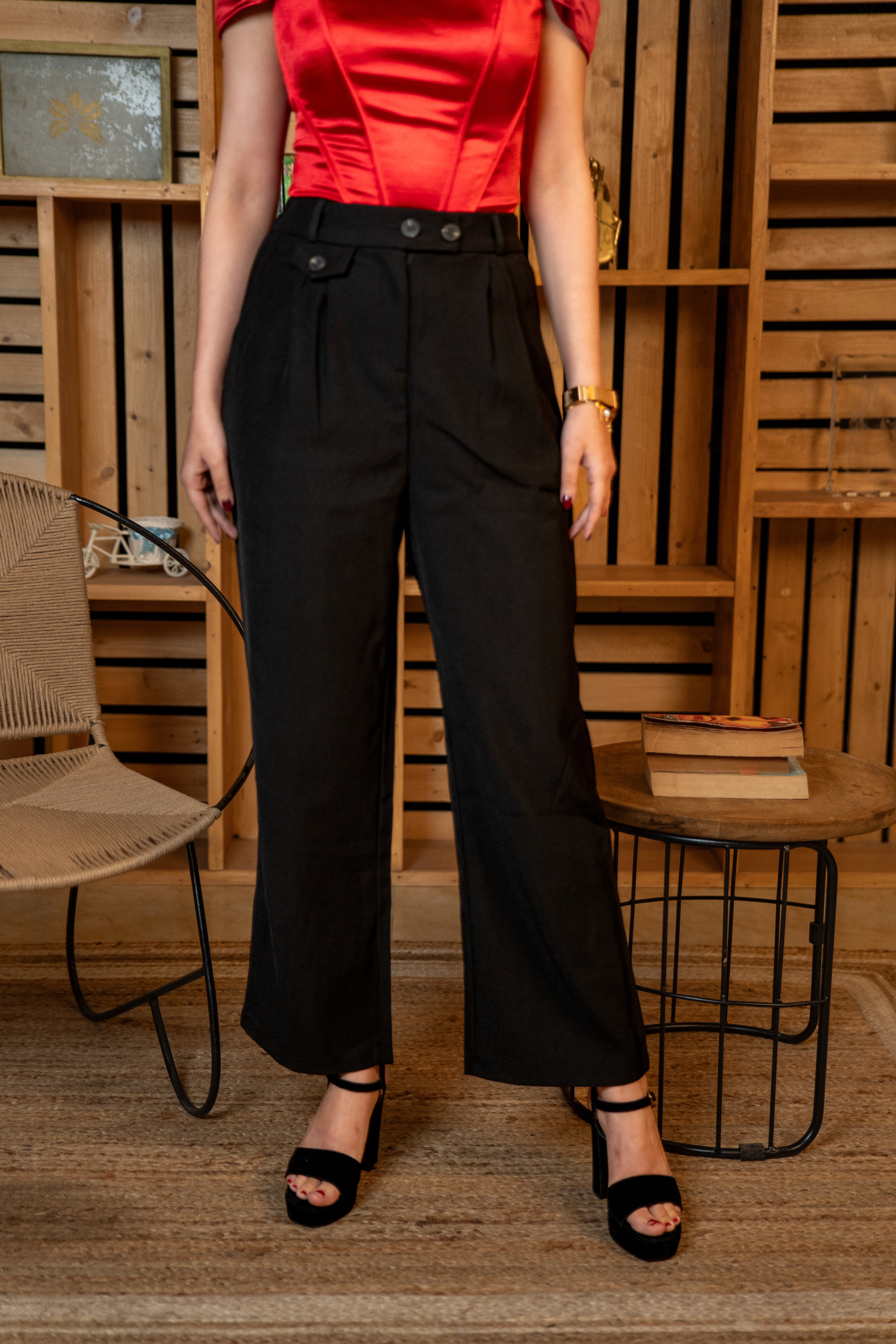 Office look with black pants and heels (front profile)