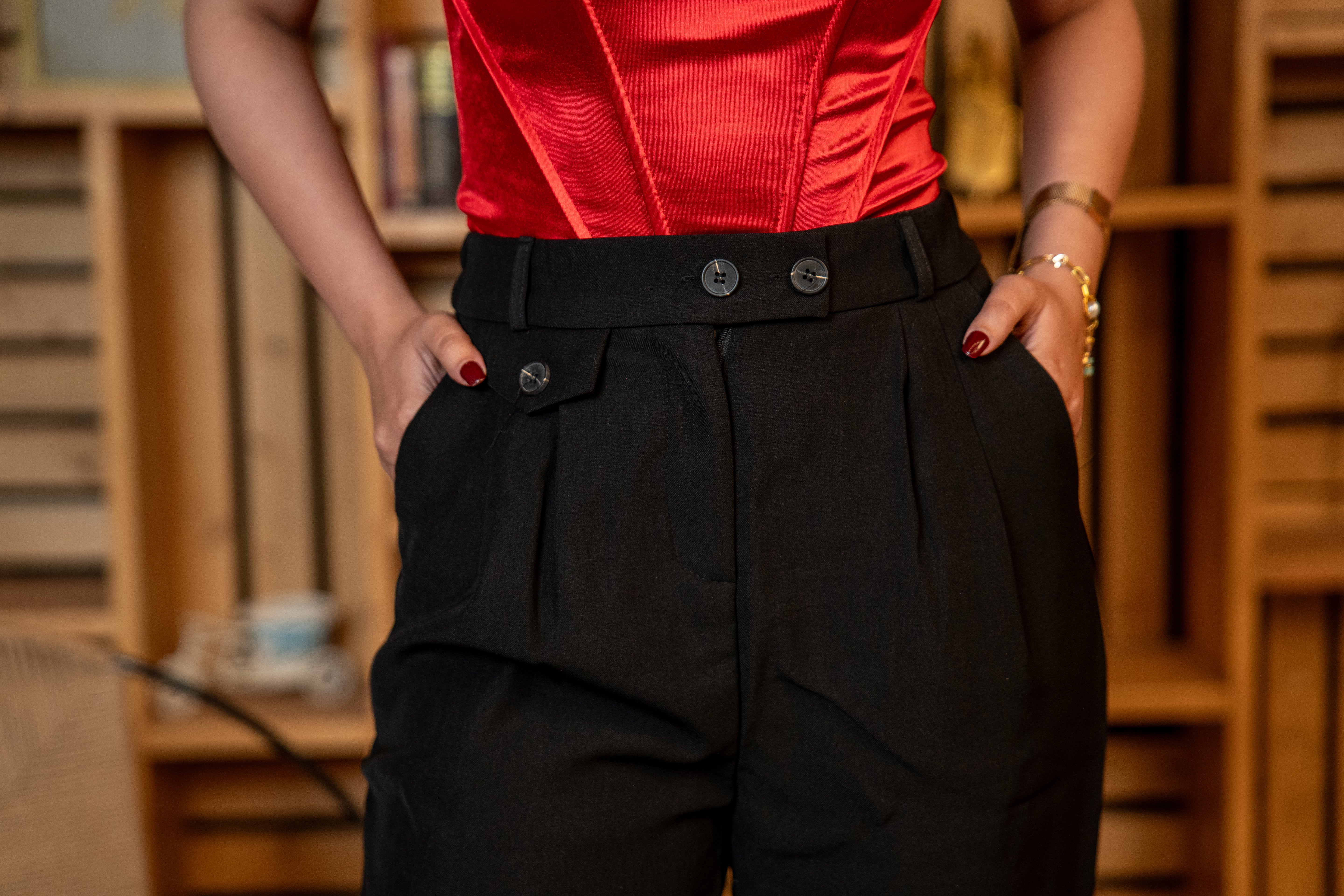 Close-up of waistband and tailoring on black pants