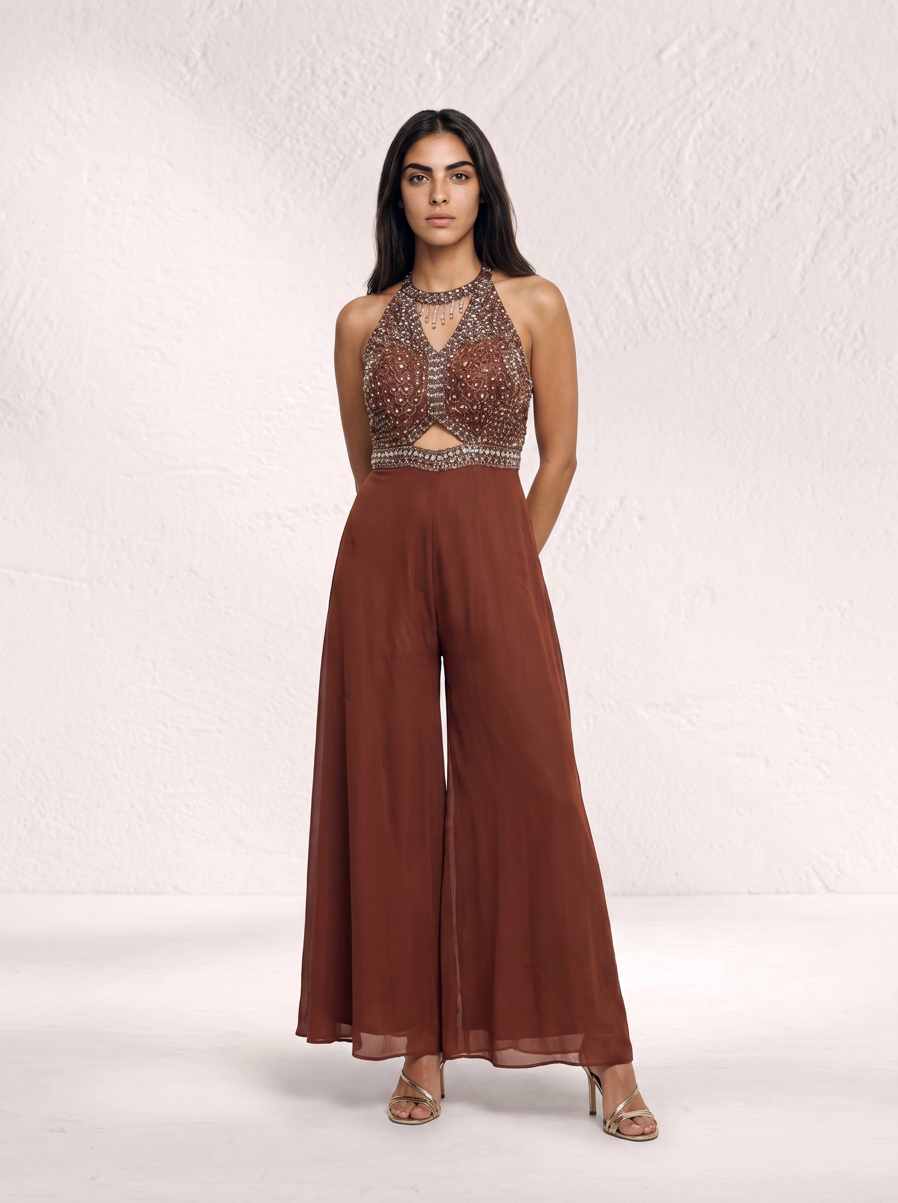 Ragini Hand-Beaded Halter Cut-Out Jumpsuit in Rust Brown