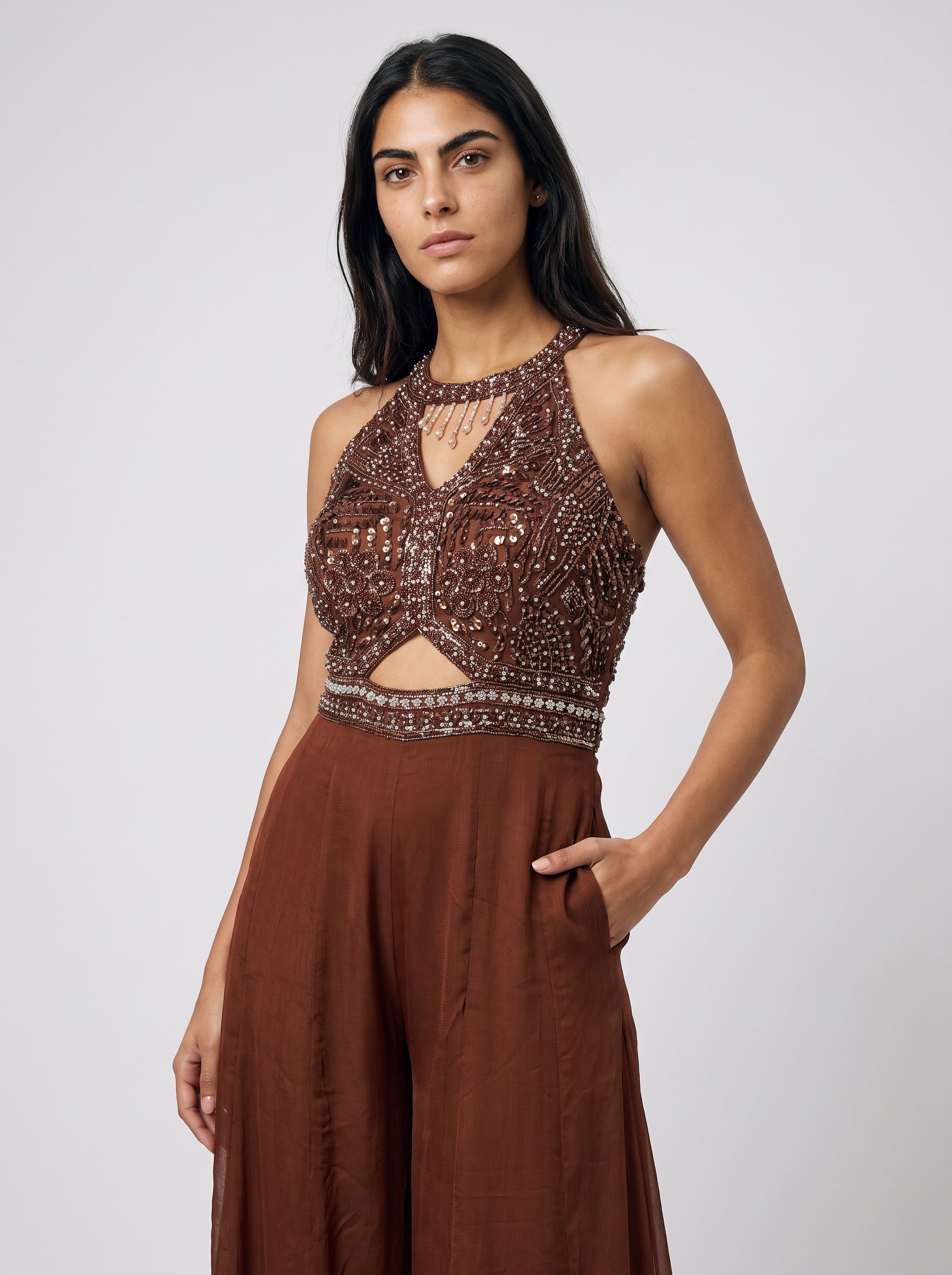 Ragini Hand-Beaded Halter Cut-Out Jumpsuit in Rust Brown