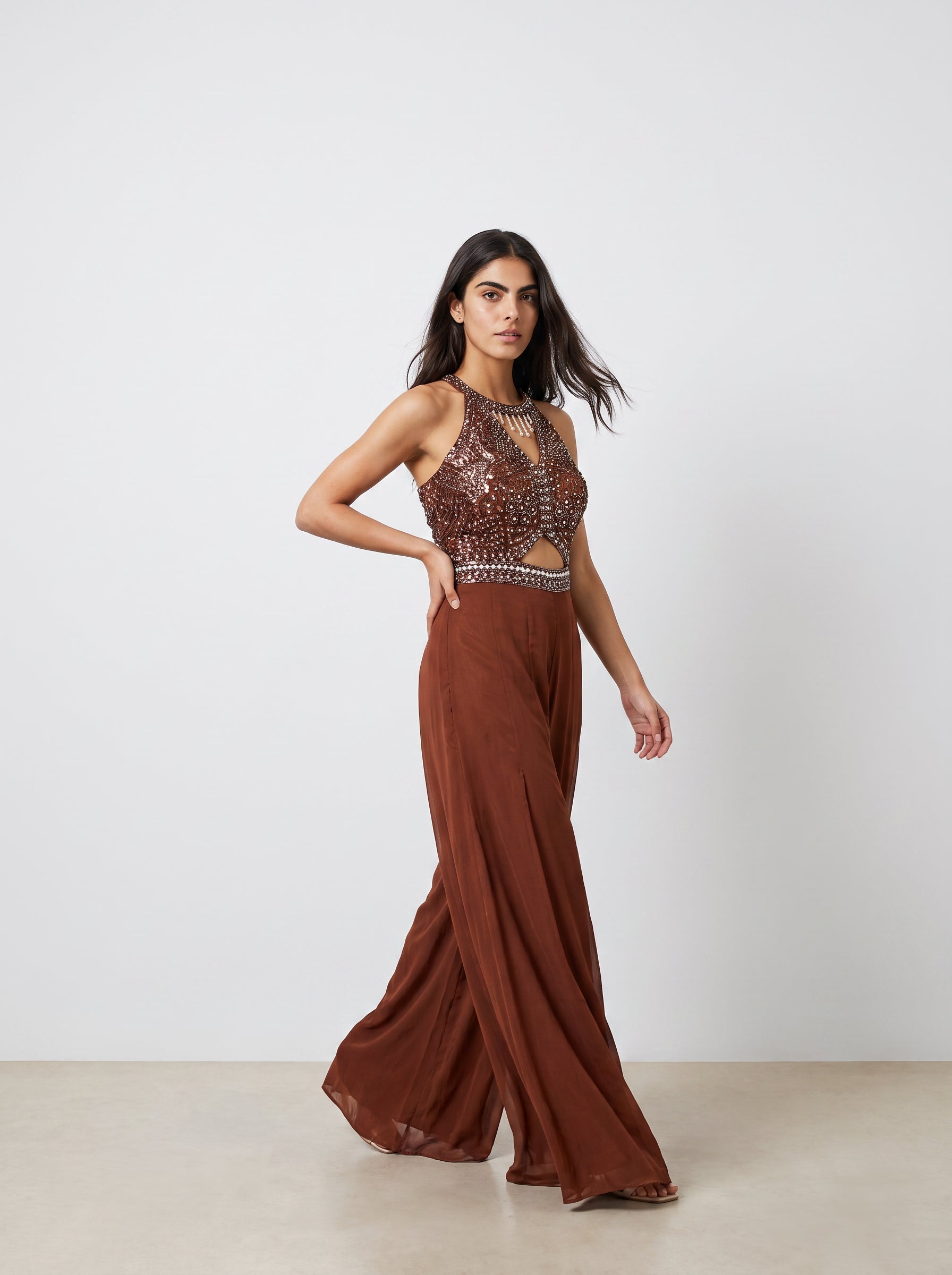 Ragini Hand-Beaded Halter Cut-Out Jumpsuit in Rust Brown