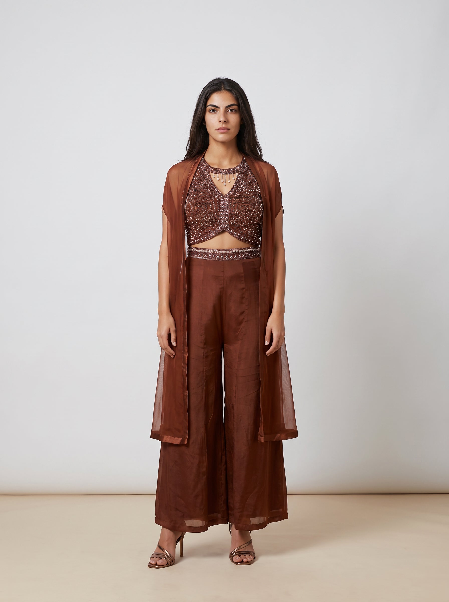 Ragini Hand-Beaded Halter Cut-Out Jumpsuit in Rust Brown