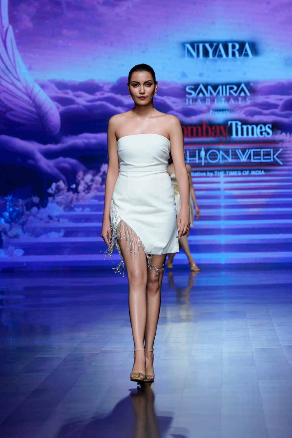 White strapless mini cocktail dress with crystal tassels (front profile)