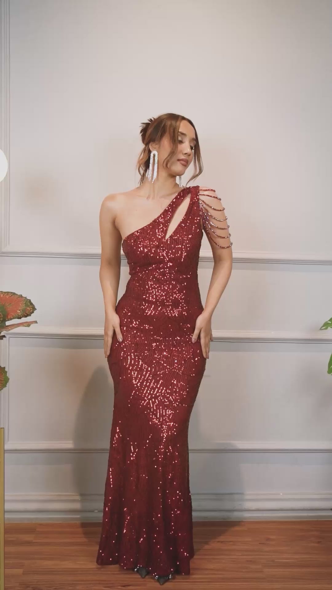 Woman wearing a One-Shoulder Red Sequin Dress.